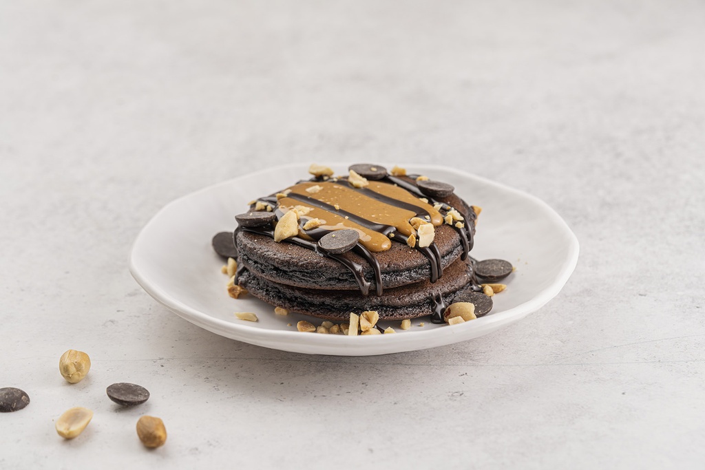 Gluten-Free Chocolate Pancake topped with Peanut Butter Sauce