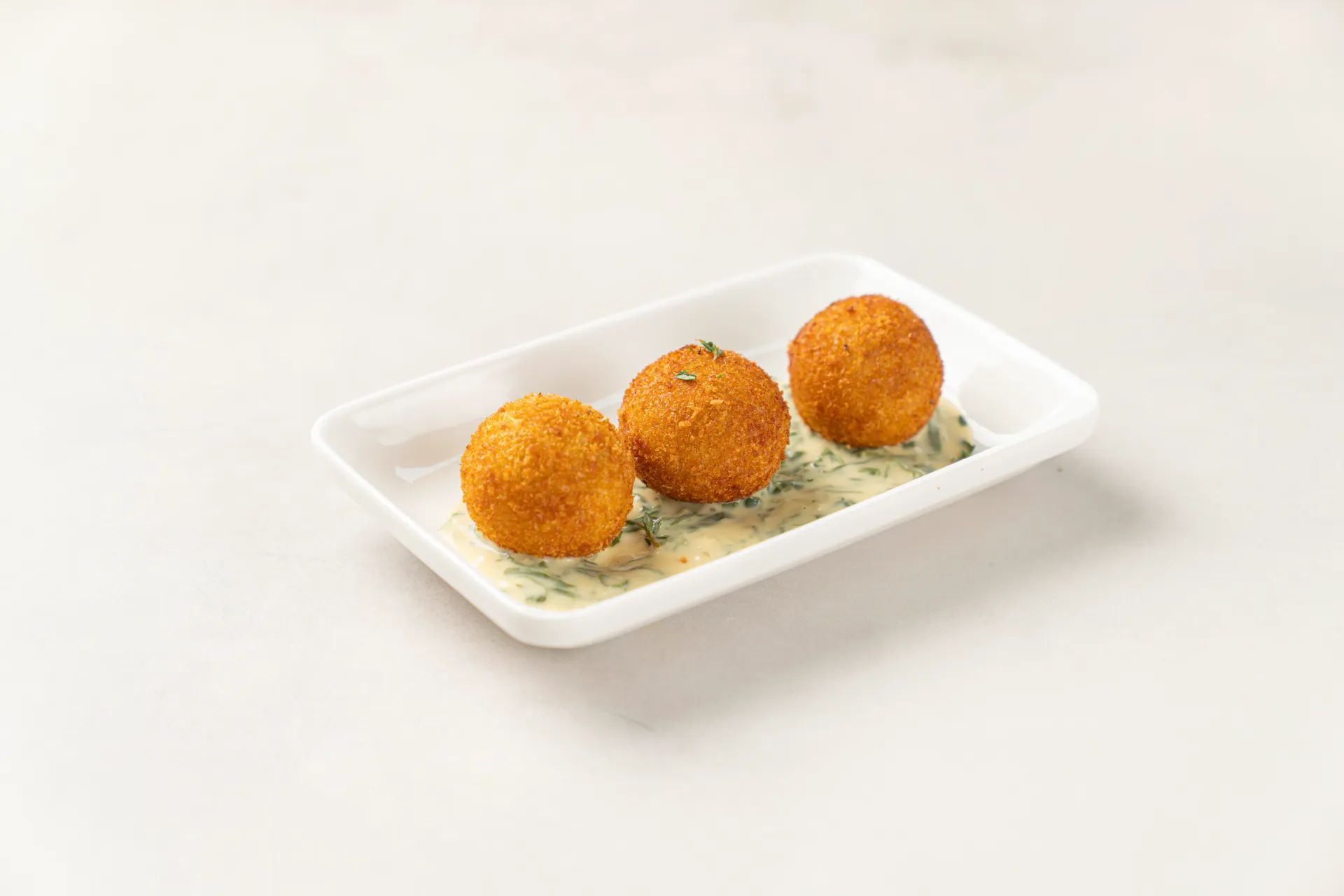 Potato Ball With Spinach Sauce 